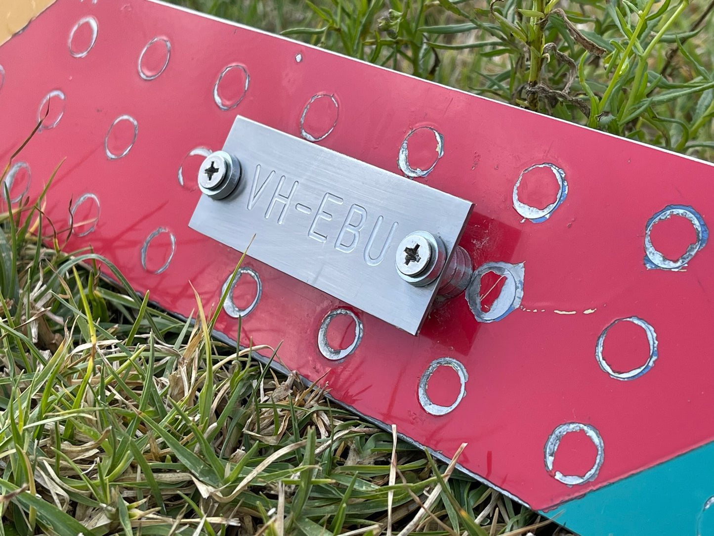 Non-destructable registration plate - VH-EBU