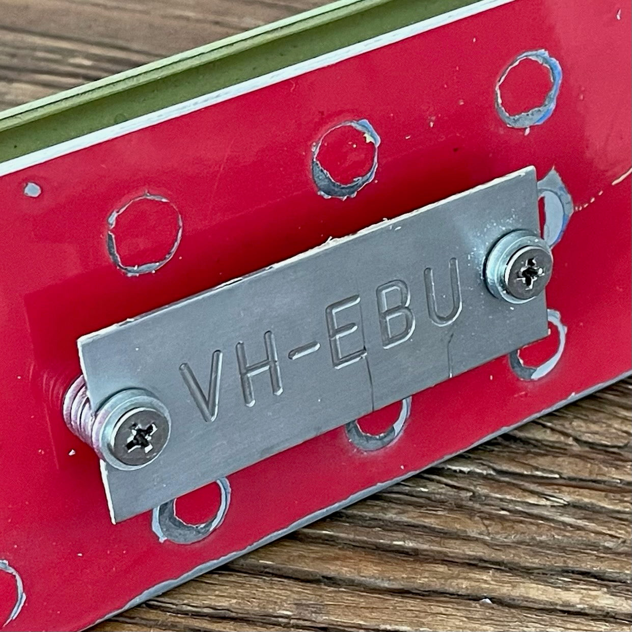 Non-destructable registration plate - VH-EBU